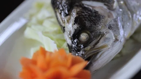 Closeup clip of a Fish Head Dish Stock Footage 90939533