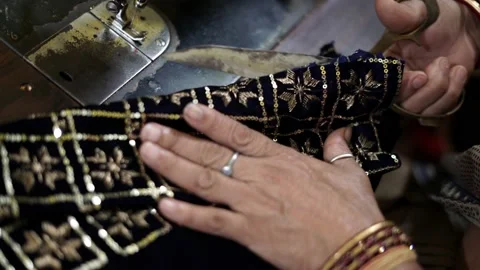 Closeup of cloth cutting, a worker working in textile factory and sewing fabric Stock-Footage 205164307