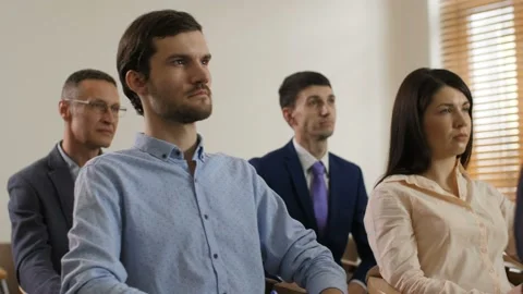 Closeup co-workers' team in formal wear at meeting Stock Footage 108010743