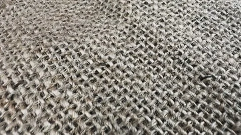 Closeup of a coarse brown burlap fabric texture Stock Footage 340581053