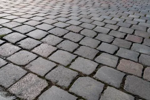 Closeup of a cobblestone road for backgrounds Stock Photos