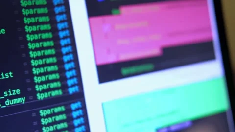Closeup coding on Programmer working on online application database. Coder Stock-Footage 334586243
