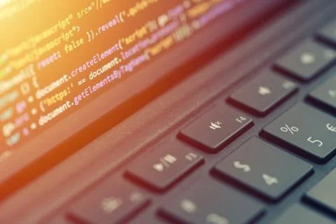 Closeup coding, programming on laptop screen, web development, developer Stock Photos