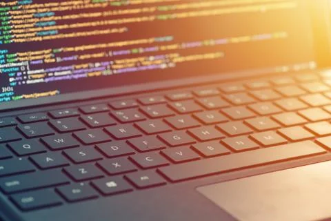 Closeup coding, programming on laptop screen, web development, developer Stock Photos