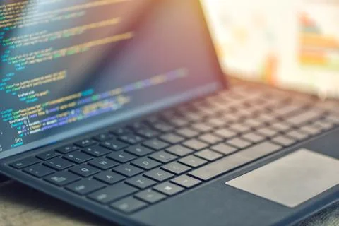 Closeup coding, programming on laptop screen, web development, developer Stock Photos