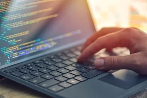 Closeup coding on screen, hands coding html and programming on screen laptop, Stock Photos