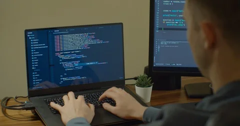 Closeup coding on screen, Man hands coding html and programming on screen Stock Footage 129445247