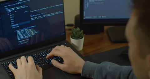 Closeup coding on screen, Man hands coding html and programming on screen Stock Footage 129446358
