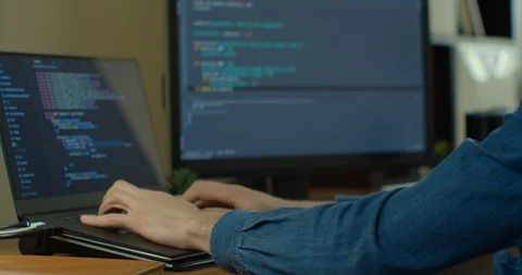 Closeup coding on screen, Man hands coding html and programming on screen Stock Footage 129447878