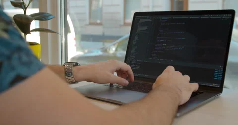 Closeup coding on screen, Man hands coding html and programming on screen laptop Stock Footage 137170909