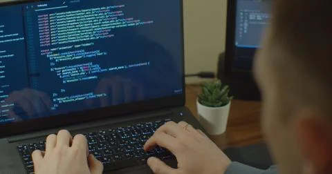 Closeup coding on screen, Man hands coding html and programming on screen Foto stock