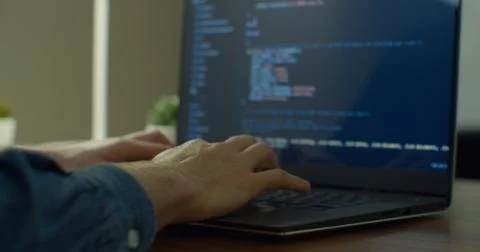 Closeup coding on screen, Man hands coding html and programming on screen laptop Stock Photos