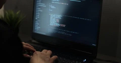 Closeup coding on screen, woman hands coding html and programming on screen Stock Photos