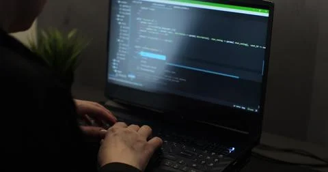 Closeup coding on screen, woman hands coding html and programming on screen 写真素材