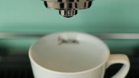Closeup of coffee machine pouring espresso Stock Footage 127850398