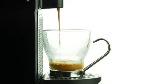 Closeup Coffee maker pouring hot coffe espresso Video stock 70820949