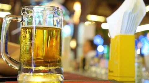 Closeup of Cold Pint of Beer on Bar Counter Stock Footage 59689097