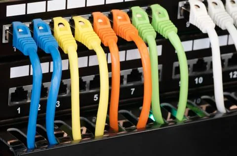 Closeup of  colored computer network cables  connected to a  switch Stock Photos