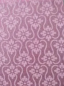 Closeup of colorful abstract geometric repeating fabric design texture and pa Stock Photos