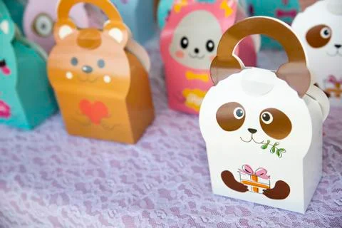 A closeup of colorful candy boxes with characters printed on them Stock Photos