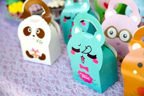 A closeup of colorful candy boxes with characters printed on them Stock Photos