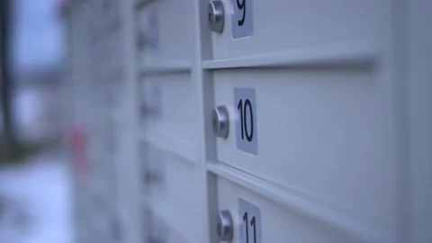 Closeup of Community Mailbox during winter - Canadian Modern Canada Post Stock Footage 171163350