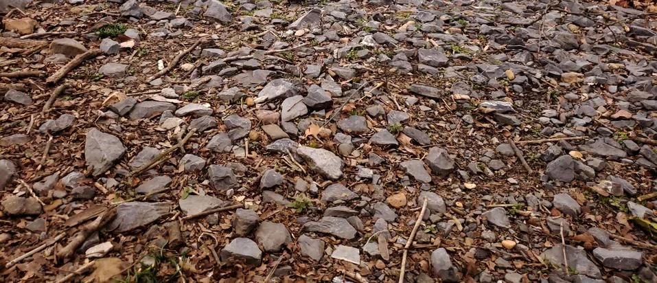 Closeup compacted rock stone path Foto stock