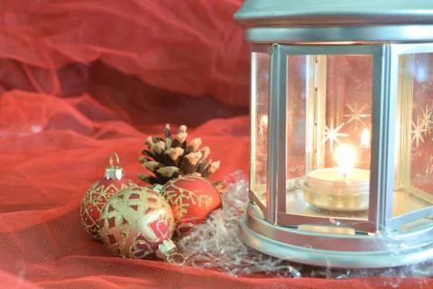 Closeup of a composition of Christmas decorations on a red background 스톡 사진