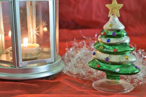 Closeup of a composition of Christmas decorations on a red background 库存照片