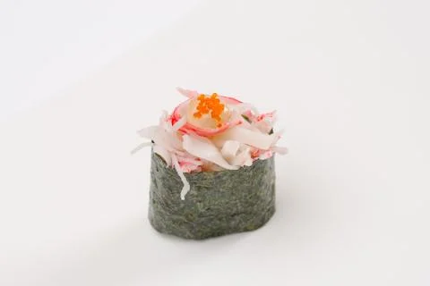 Closeup composition of one fresh salmon sashimi sushi with caviar on top on w Stock Photos