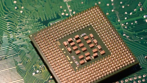 Closeup of Computer Chip Processor over electronic green circuit. Stock Footage 93926723