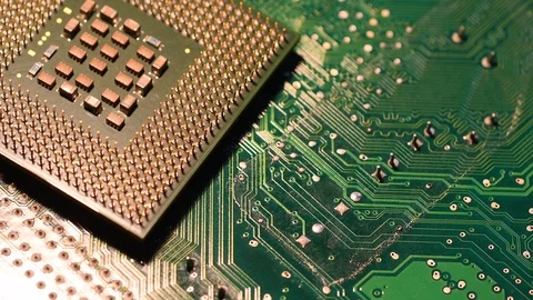 Closeup of Computer Chip Processor over electronic green circuit. Stock Footage 93926732