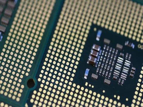 Closeup of Computer Chip Processors aligned on rotating dolly Stock Footage 80535587