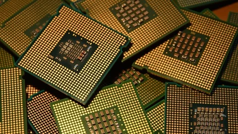 Closeup of Computer Chip Processors rotating on dolly. Stock Footage 93925996