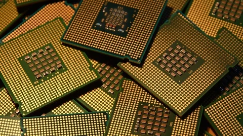 Closeup of Computer Chip Processors rotating on dolly. Stock Footage 93925998