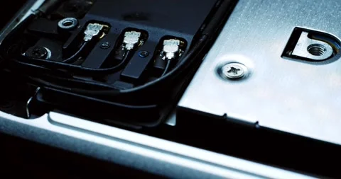 Closeup of computer component with connectors, highlighting intricate design Vídeos de archivo 294235118
