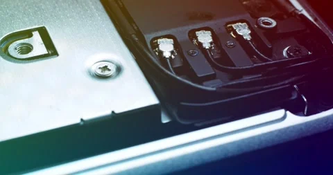 Closeup of computer component with connectors, highlighting intricate design Vídeos de archivo 294243425
