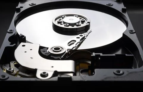 Closeup of a computer hard disk interior parts Stock Photos