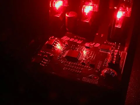 Closeup computer mainboard chipset with red light color 스톡 사진
