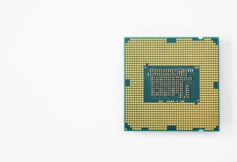 Closeup of a computer microprocessor isolated on a white background Stock Photos