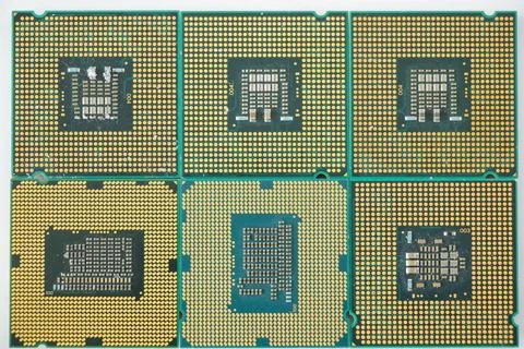 Closeup of computer microprocessors isolated on a white background Stock Photos