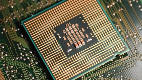 Closeup of Computer Processor CPU on electronic circuit board, rotating dolly. Stock Footage 88505556