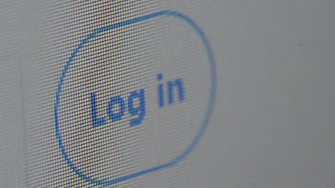 Closeup of computer screen with cursor pointing log in menu Stock Footage 98797640