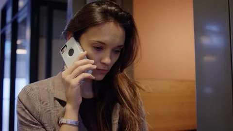 Closeup Of Confident Young Professional Taking A Business Call In Hallway Stock Footage 97320070