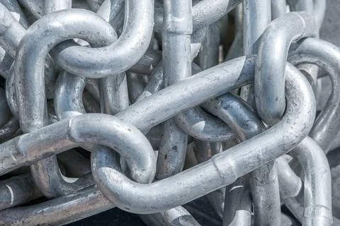 Closeup of Construction metal silver chains as background Foto stock