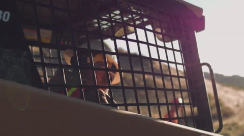 Closeup of construction worker inside machine Stock Footage 55153611