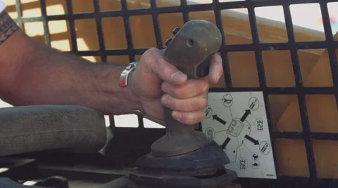 Closeup of construction worker operating machinery joystick Stock Footage 55142133