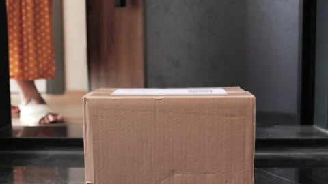 Closeup of Contactless Delivery of Internet Ordered Goods, Cardboard Box Package Stock Footage 197562744