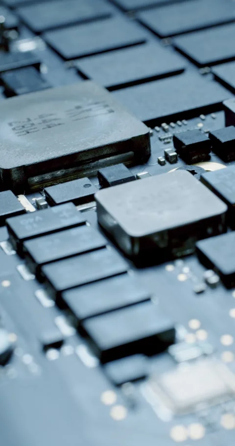 CloseUp of Contemporary Circuit Board Featuring Integrated Chips and Components Stock Footage 294080564