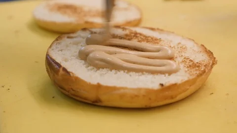 Closeup cook covers fried white bread slices with sauce Stock Footage 104841534